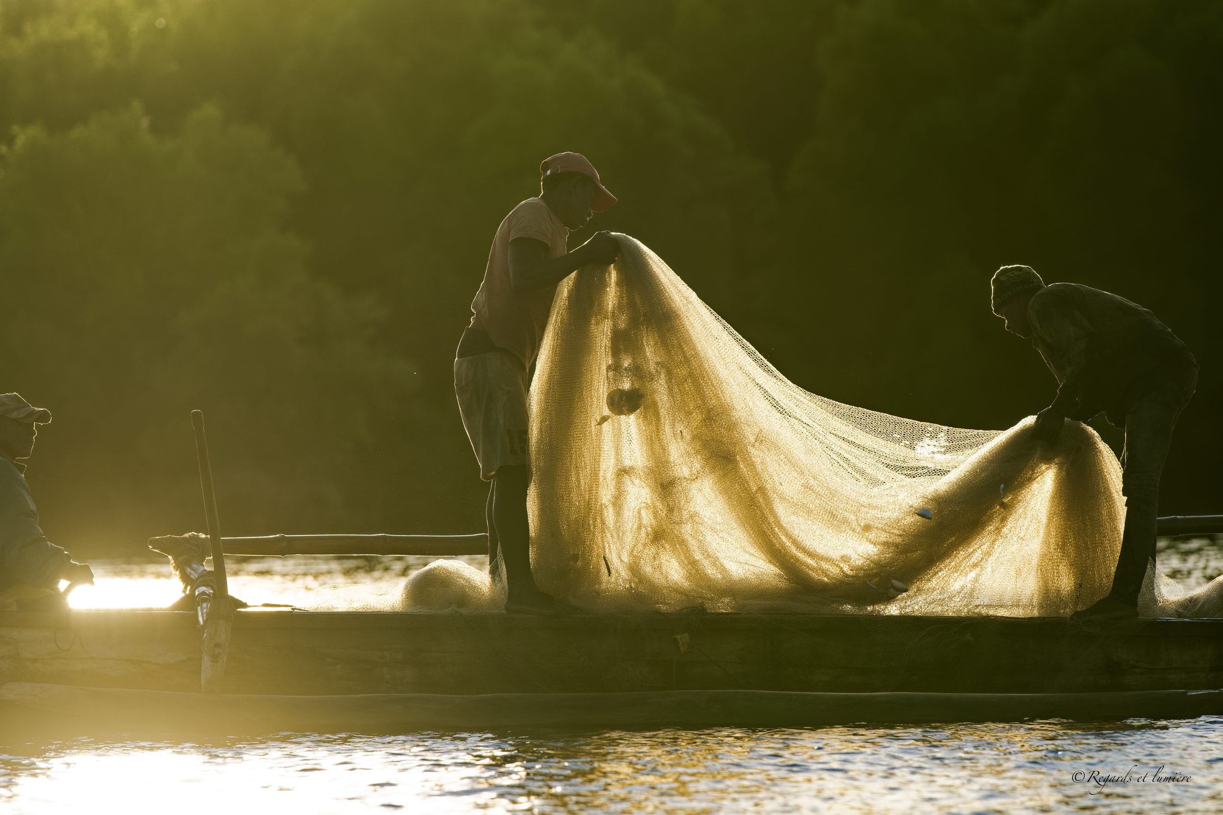 Pêcheurs dans la lumière du soir